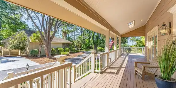 Image 4: This front covered porch could be used just to rel