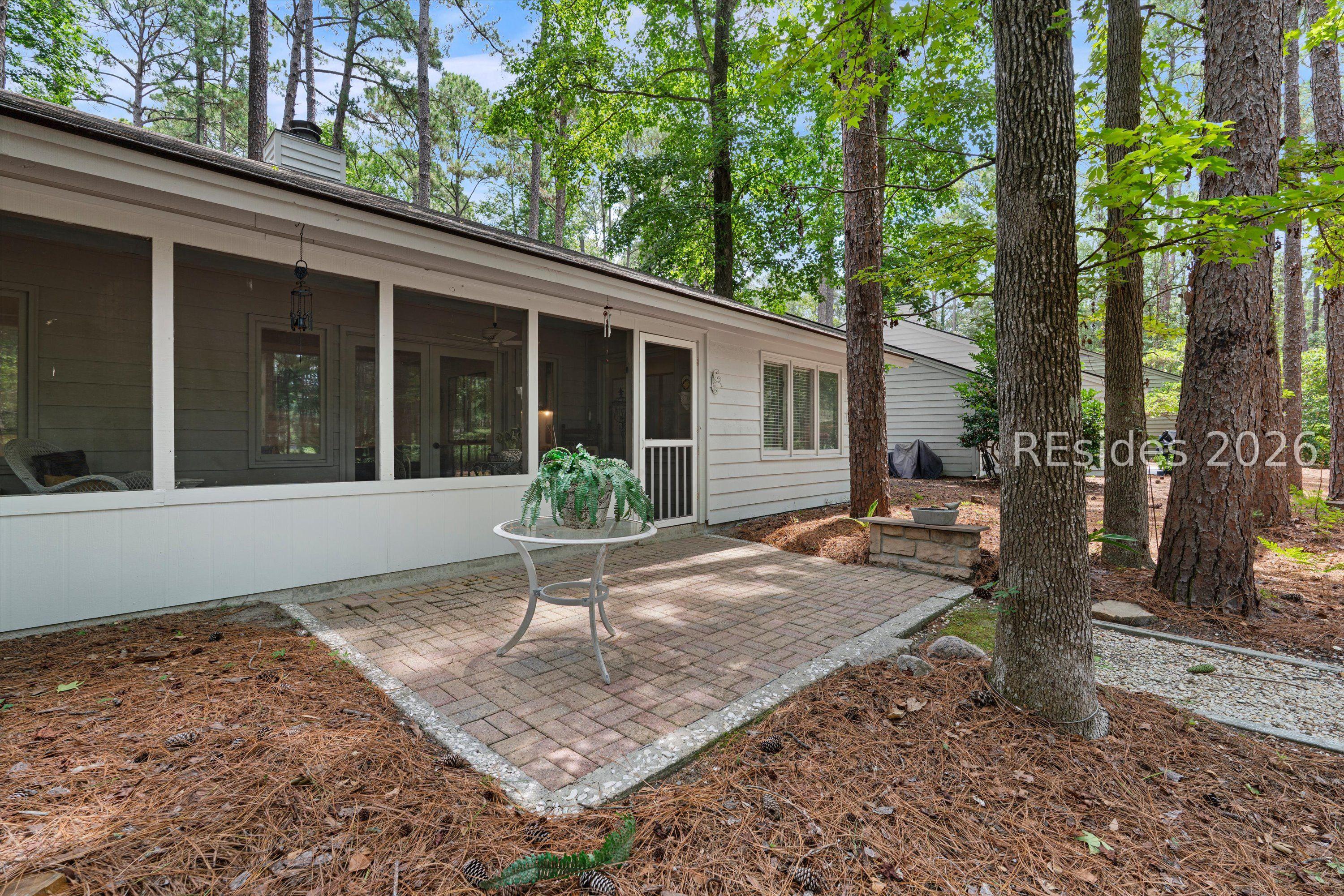 Image 2: Private Rear Patio/ Screen Porch
