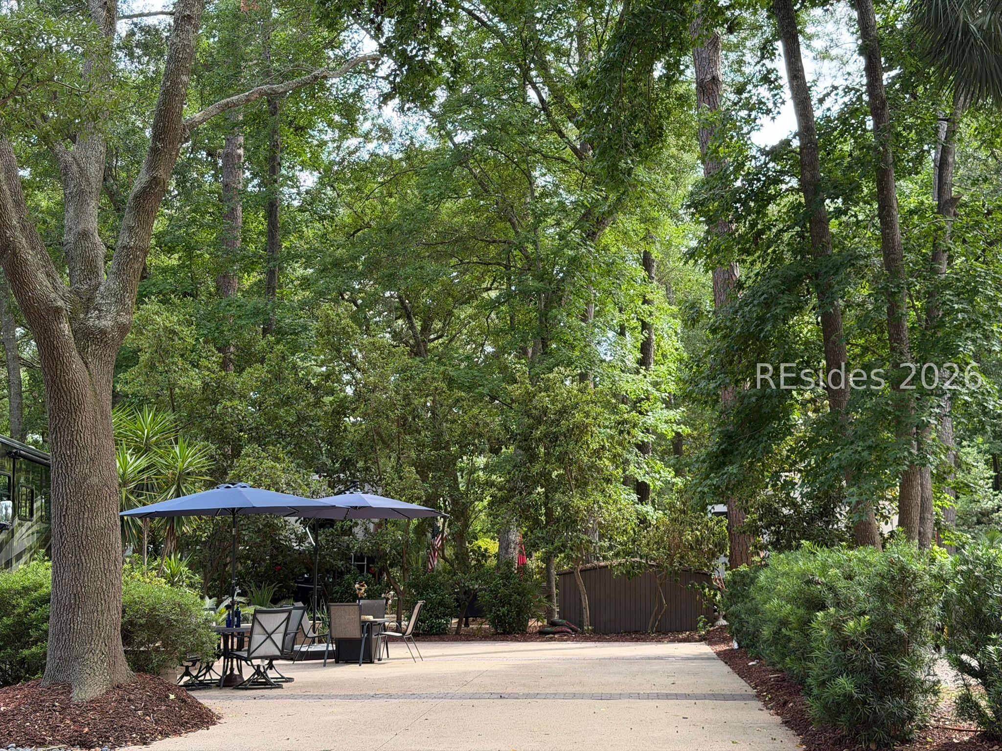 Image 2: Lot #40 from street, upgraded pedestal/landscaping