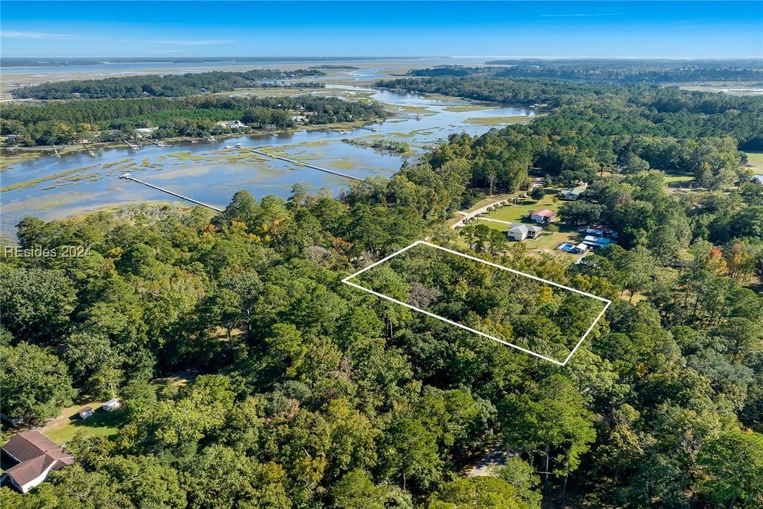 Image 4: Aerial view featuring a water view