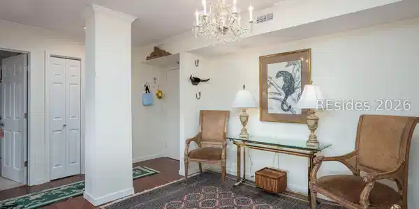 Image 4: Foyer area furniture included Image 4: Foyer area furniture included