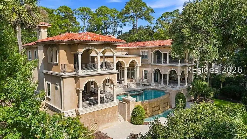 Image 1: Back Exterior View with Infinity Pool Image 1: Back Exterior View with Infinity Pool