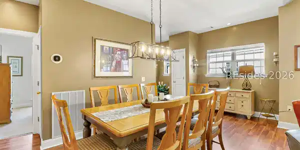 Image 3: Villa entrance flows into sunny, open dining area. Image 3: Villa entrance flows into sunny, open dining area.