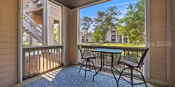 Image 4: Spacious Screened Porch with great views. Image 4: Spacious Screened Porch with great views.