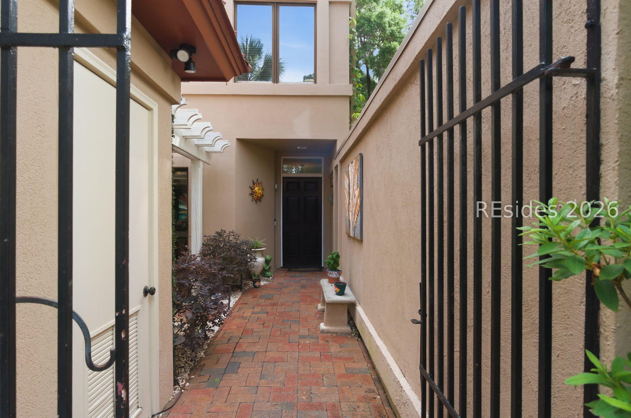 Image 4: Private brick entry into your townhome