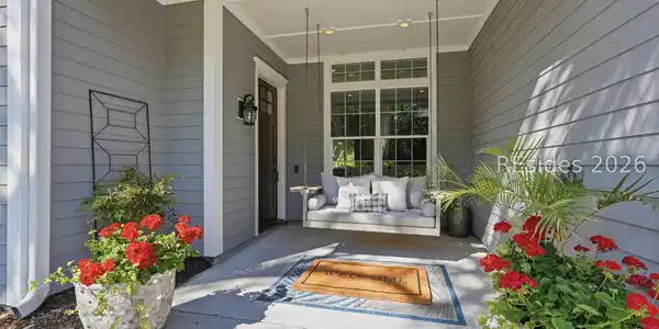 Image 3: Front porch with adorable porch swing Image 3: Front porch with adorable porch swing