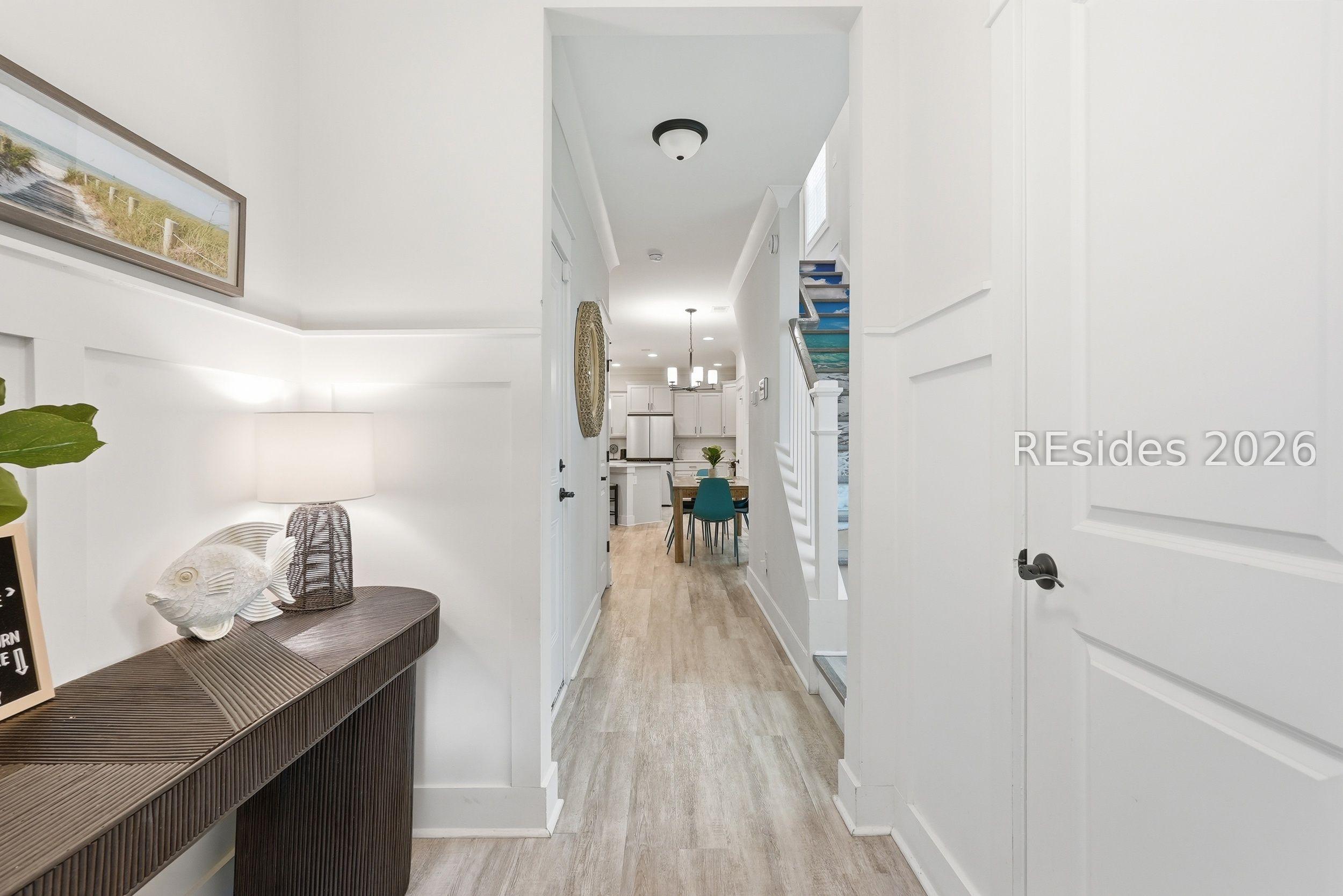 Image 4: Half bathroom to the right