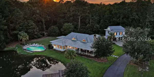 Image 2: Riverside Ranch/Twilight/ Main Home/Carriage House