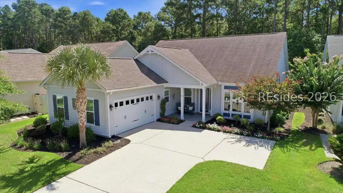 Image 1: Front View 2 car garage with golf cart area Image 1: Front View 2 car garage with golf cart area