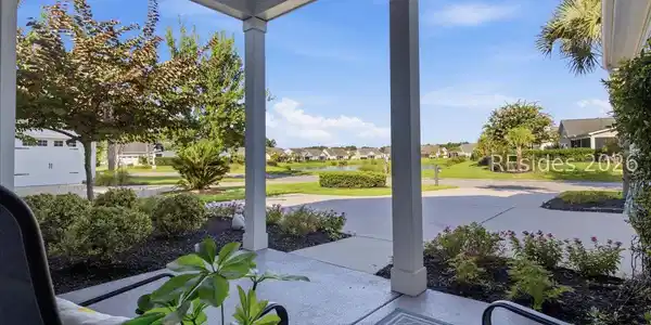 Image 4: Sitting on the porch facing a lovely view Image 4: Sitting on the porch facing a lovely view