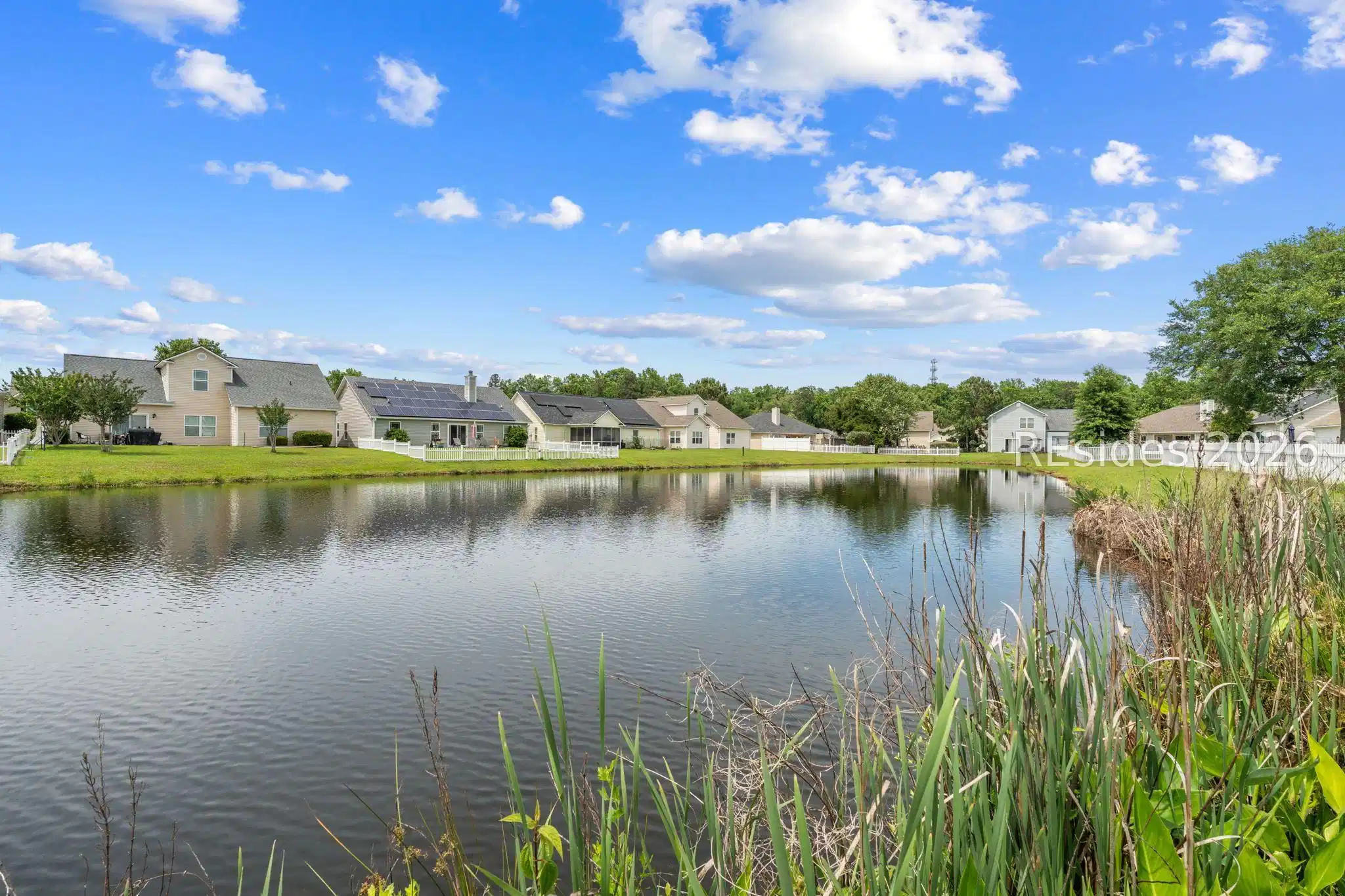 Image 1: Gorgeous lagoon views !!  (front exterior)