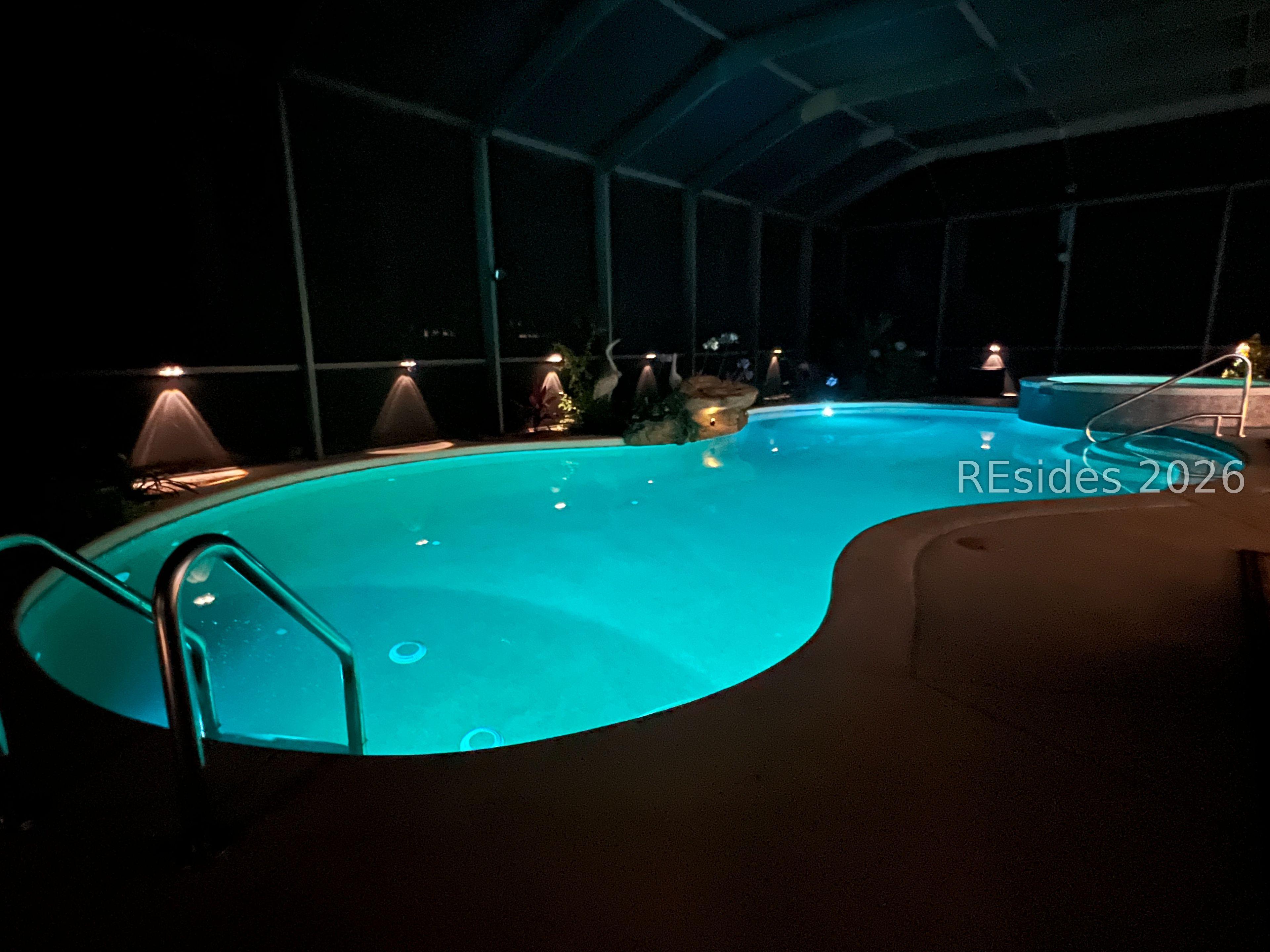 Image 3: Beautiful lit night setting of lanai