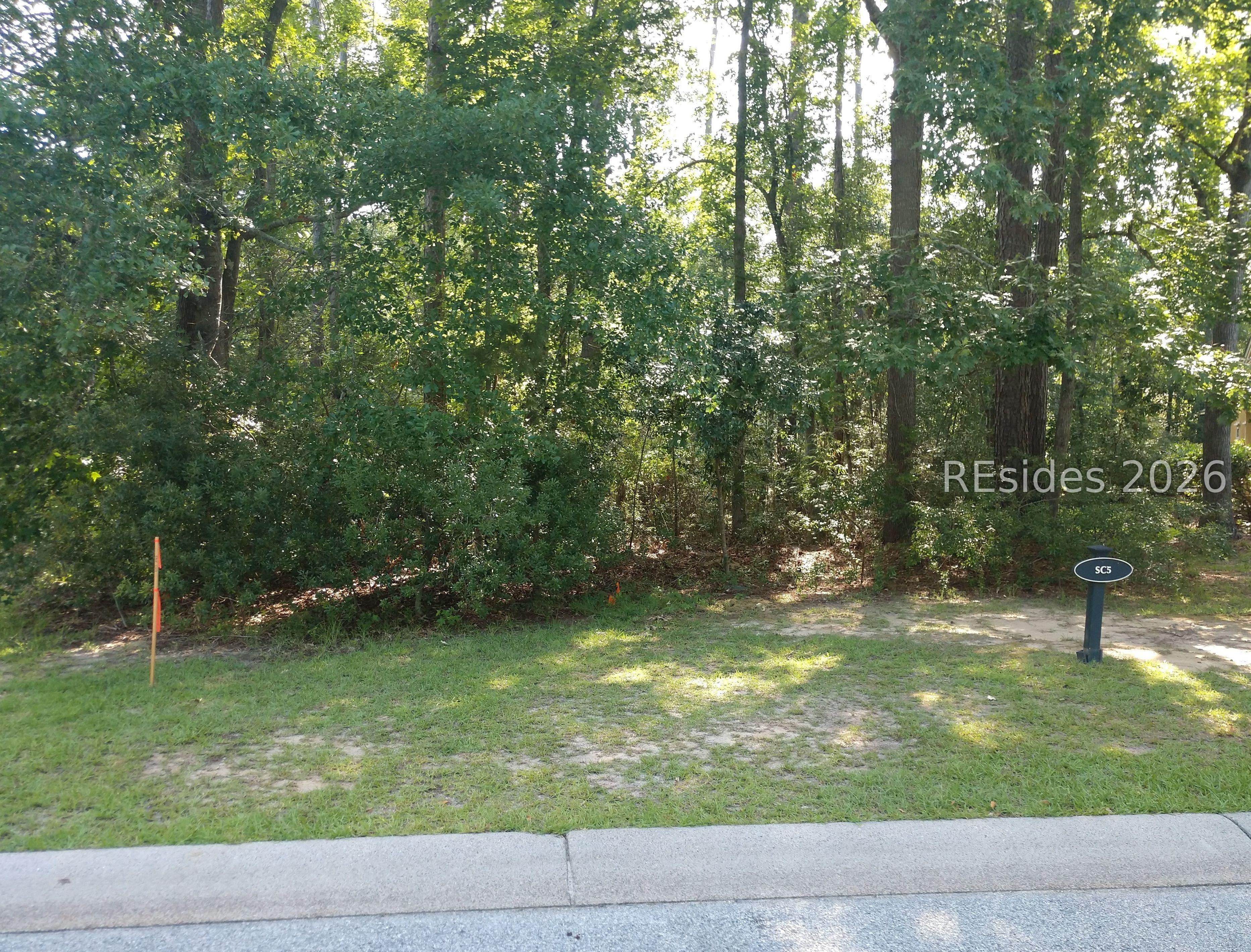 Image 1: Street view of the property.