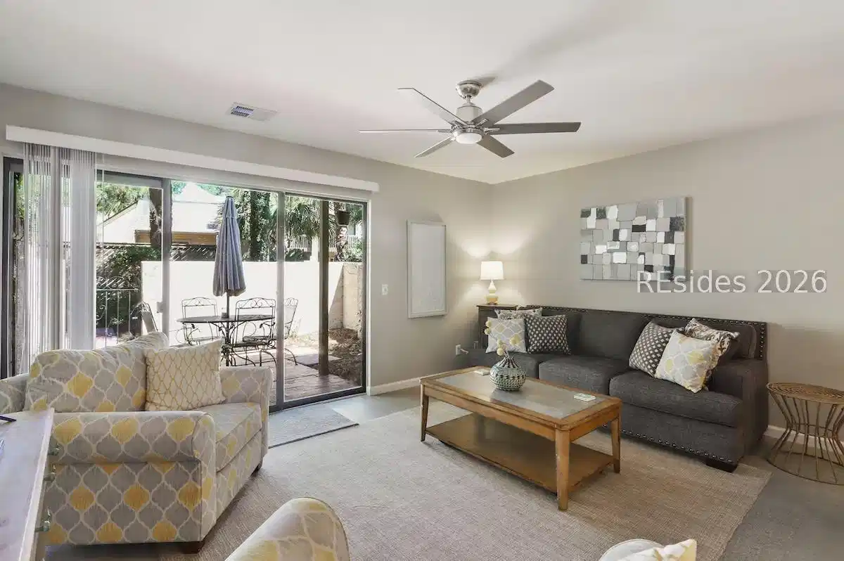 Image 1: Spacious living room at 34 HH Beach Club Villas