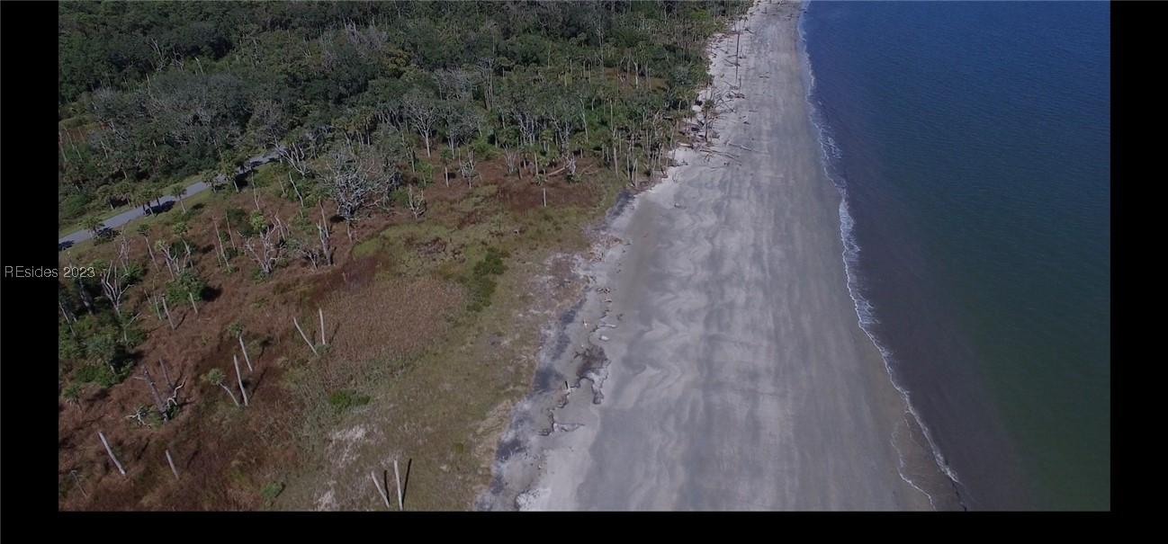Image 3: Drone / aerial view featuring a beach view and a w