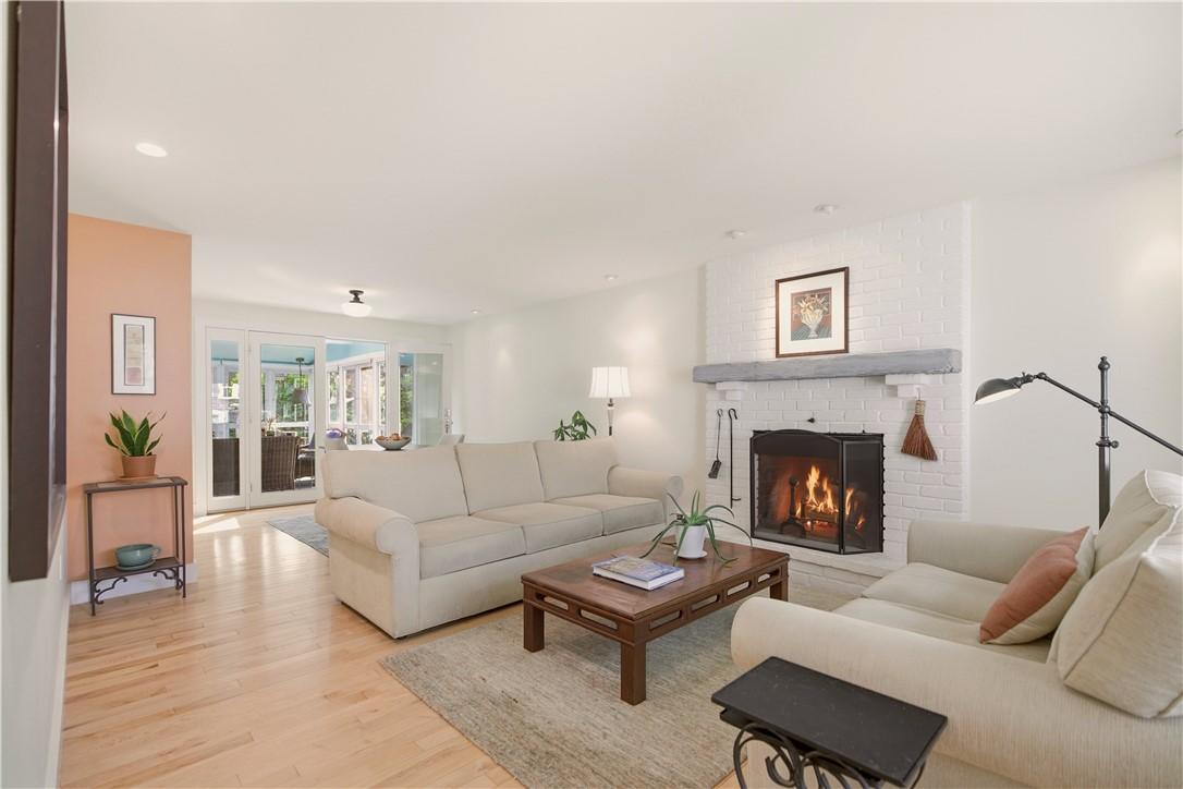 Image 4: View from front of house toward living room with w
