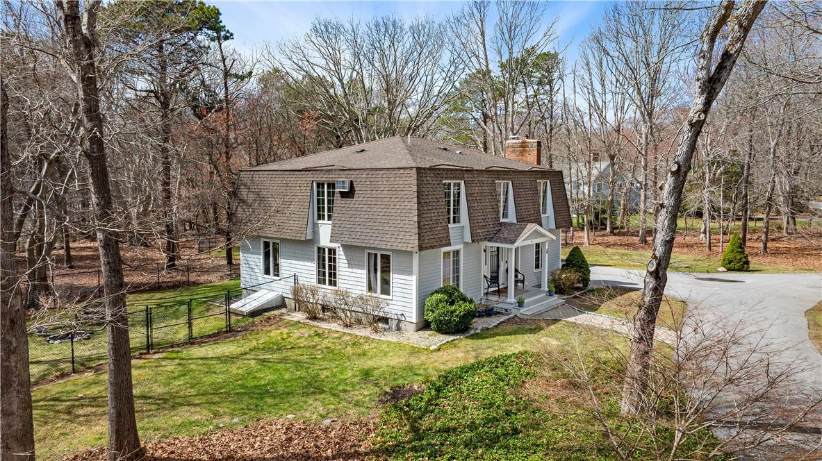 Image 3: House Set Back From Road Behind a Grove of Trees