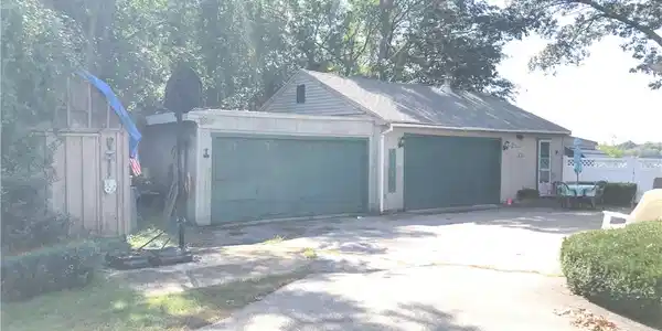 Image 2: THREE CAR GARAGE AND POOL HOUSE