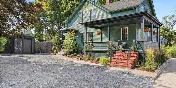 Image 2: Southeast corner of house parking fro 4 cars
