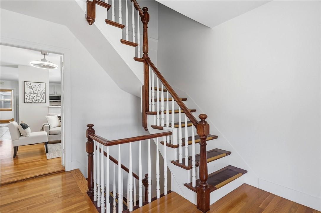 Image 4: Front hall entrance into living room.