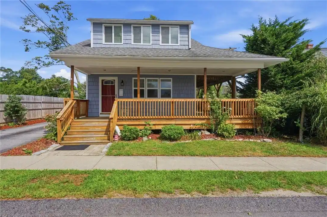 Image 1: Large wraparound porch to have your morning coffee