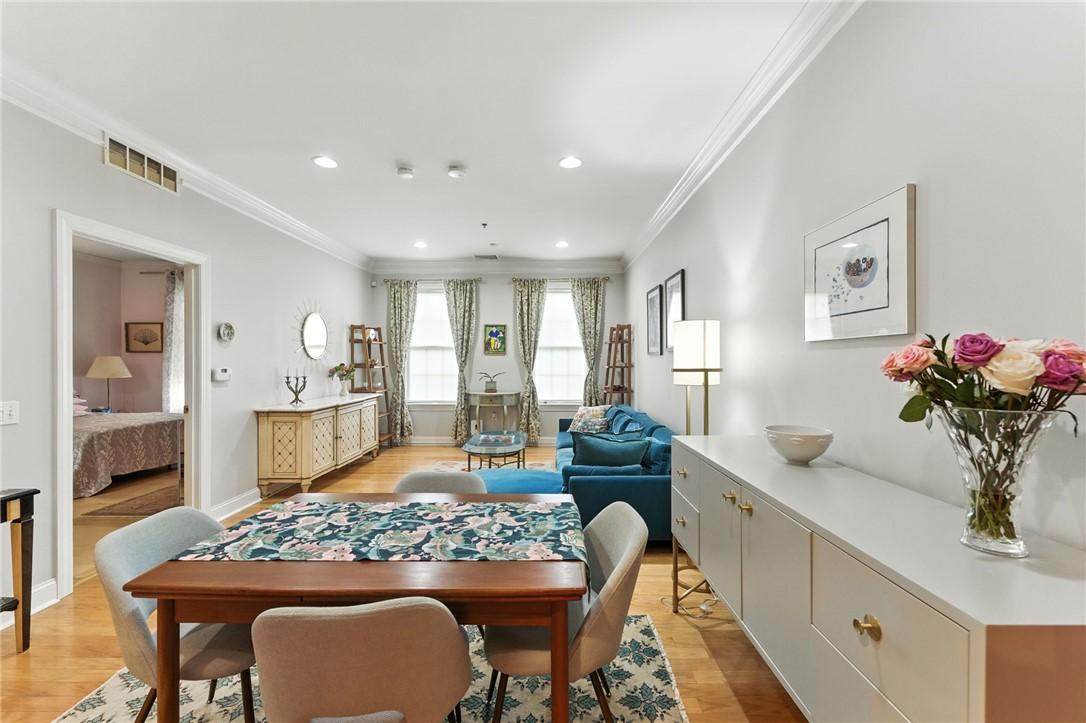 Image 2: Sunny living room with high ceilings