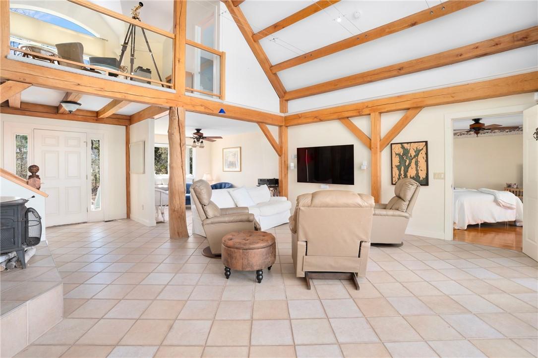 Image 4: Dramatic Post & Beam Construction greets you upon