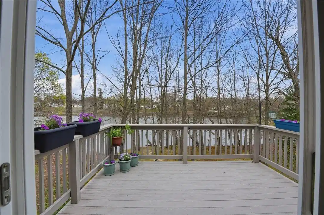 Image 1: Photo from Kitchen going out slider to deck.