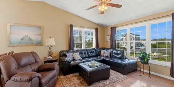 Image 2: Living Room - bright sunny living room with water