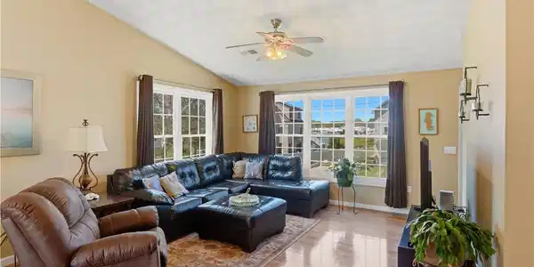 Image 3: Living Room - gleaming hardwood floors