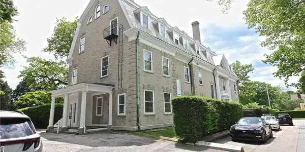 Image 3: Front & Driveway to Parking & Back Door