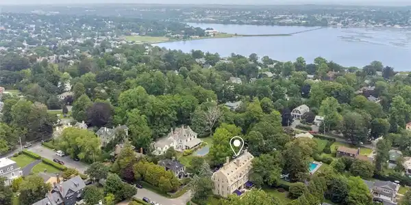 Image 4: Building and Neighborhood View to Easton's Pond Su