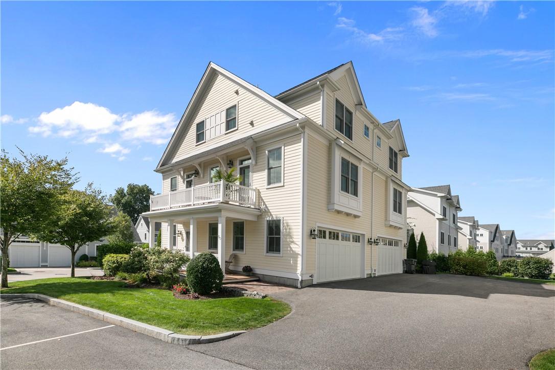 Image 2: View of Attached Garage and Parking