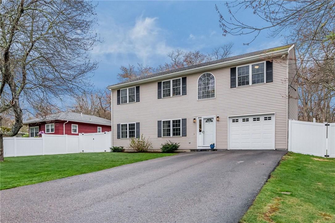 Image 2: Exterior front with garage and nice long driveway