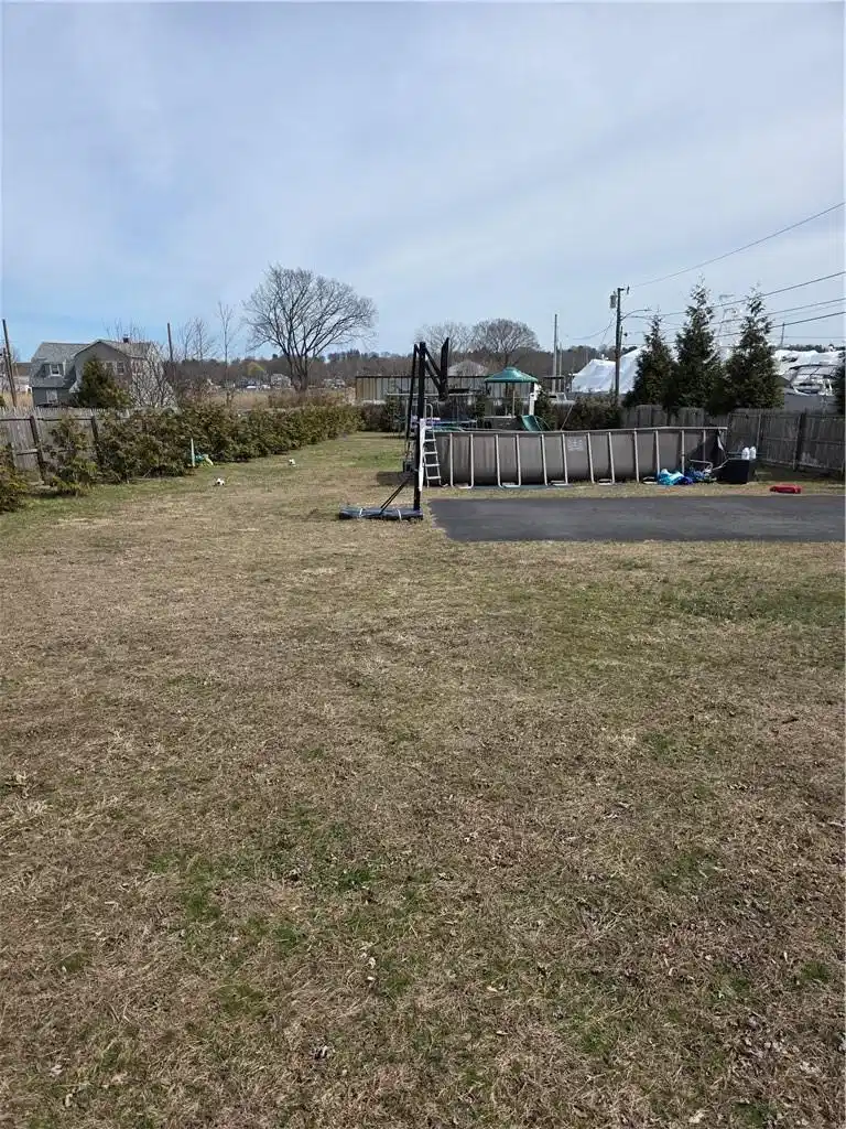 Image 1: View of Property, from West to East