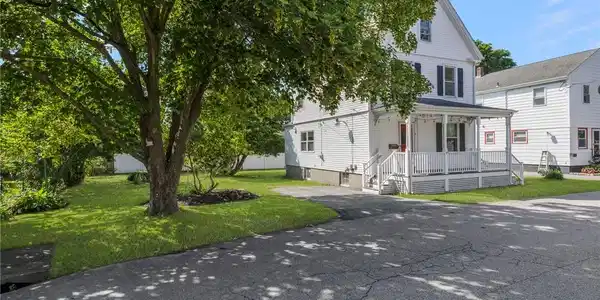 Image 3: Front of 9 Cummings and side yard