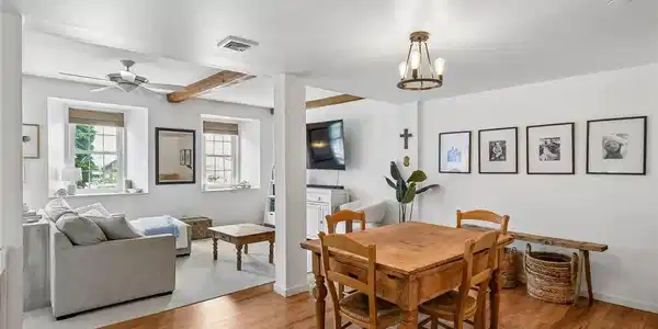 Image 2: Very charming... stunning hardwood floors...beamed