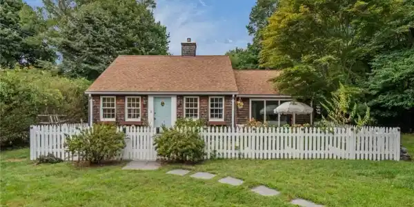 Image 3: The exterior offers offers plenty of room to garde