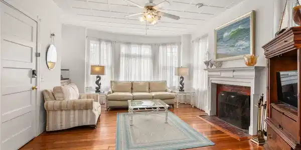 Image 4: Unit 1 The bay window allows for a sun filled hous