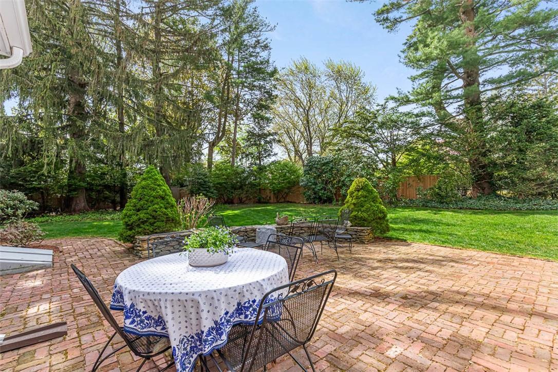 Image 2: Very private 1/2 acre lot with pretty patio