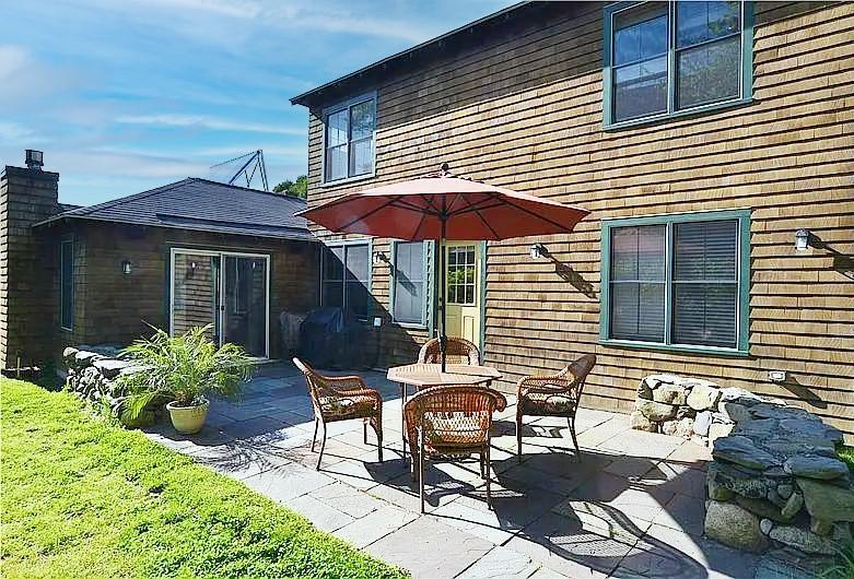 Image 1: Rear bluestone patio