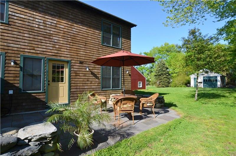 Image 3: Bluestone patio overlooking rear yard