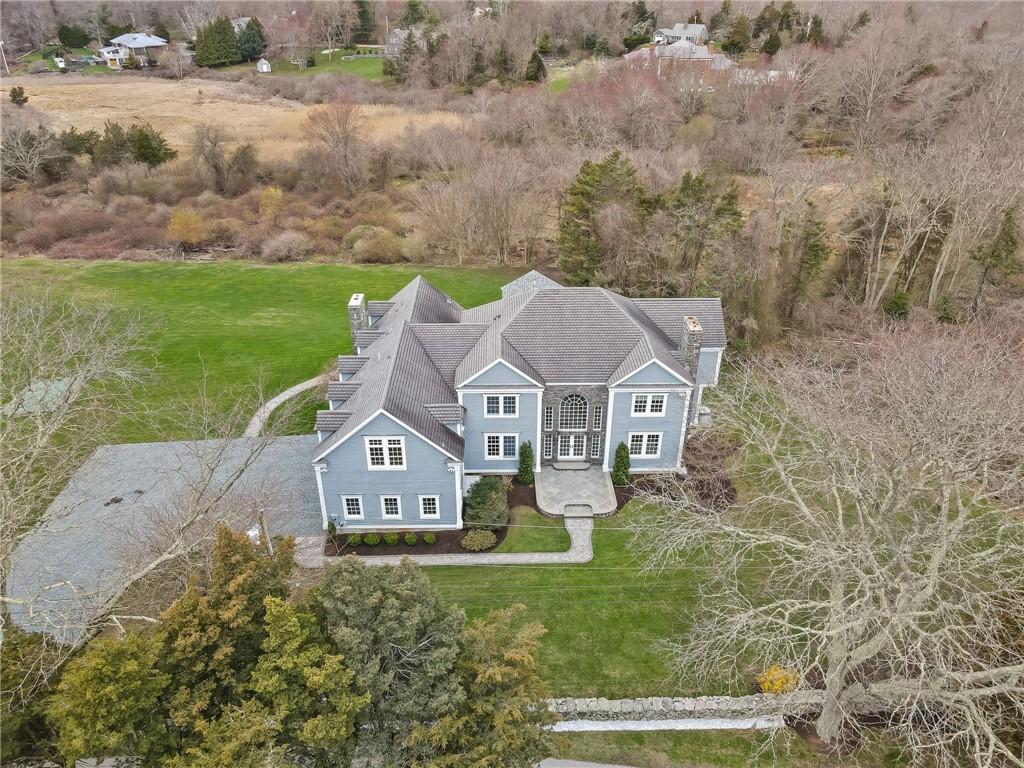 Image 2: Aerial view of this expansive colonial