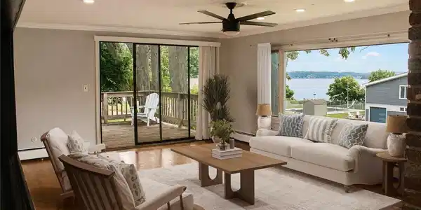 Image 4: living room with sliders to deck
(virtually stage