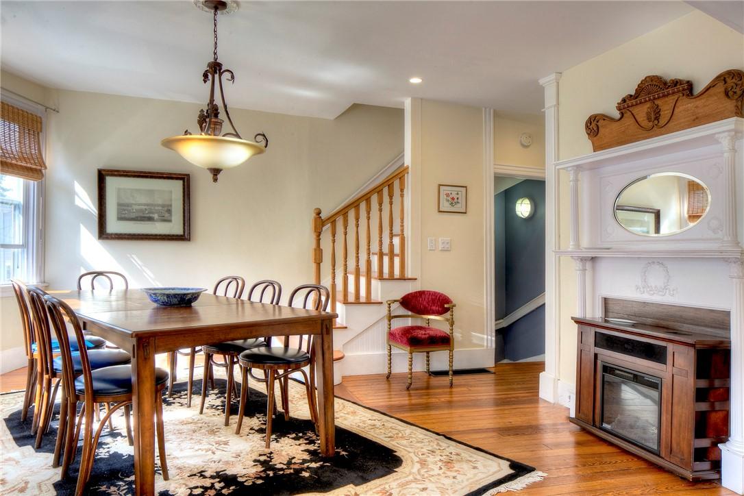 Image 3: 2nd floor unit entry with stairs leading to 3rd le