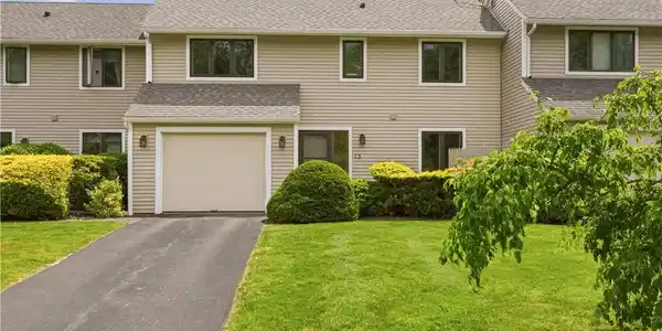Image 2: Newer Garage Door, Newer Siding Throughout the Pro