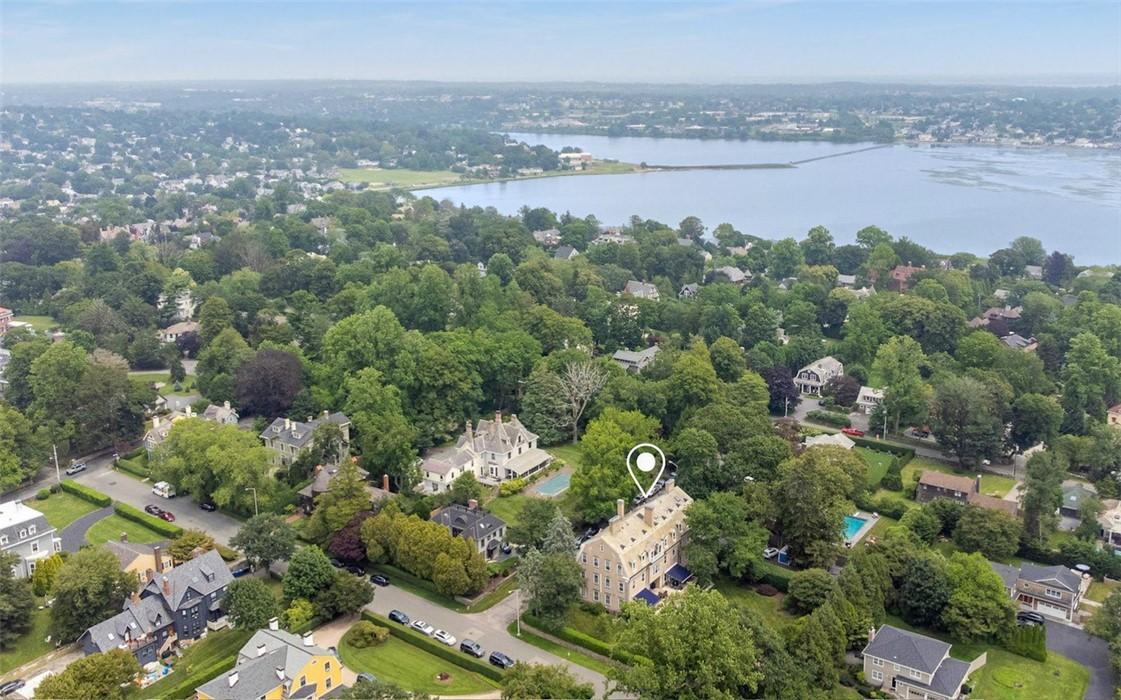 Image 4: Building and Neighborhood View to Easton's Pond Su