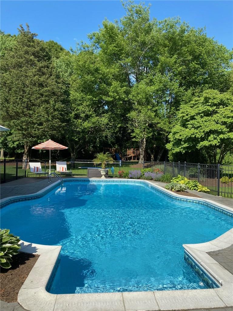 Image 4: Enjoy the beautiful pool and patio!