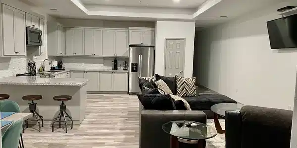 Image 2: Upstairs Kitchen/ Living Room/ Dining