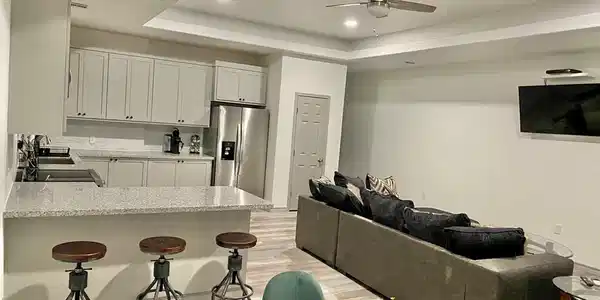 Image 3: Upstairs Kitchen/ Living Room/ Dining